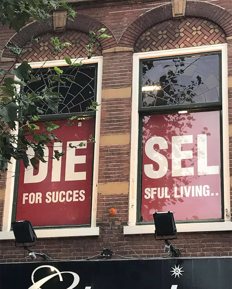 Hilarious sign with partial words: 'DIE' and 'SEL' for success andful living.
