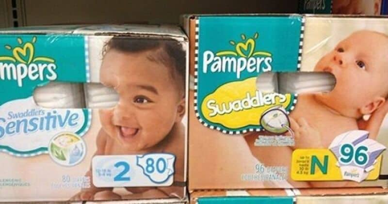 Two boxes of Pampers Swaddlers Sensitive diapers with images of babies.