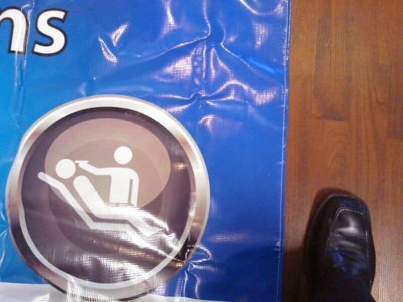 Hilarious design fail: a sign showing a person falling down stairs.