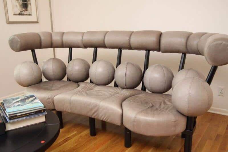 Unique sofa with large spherical armrests and backrest balls.
