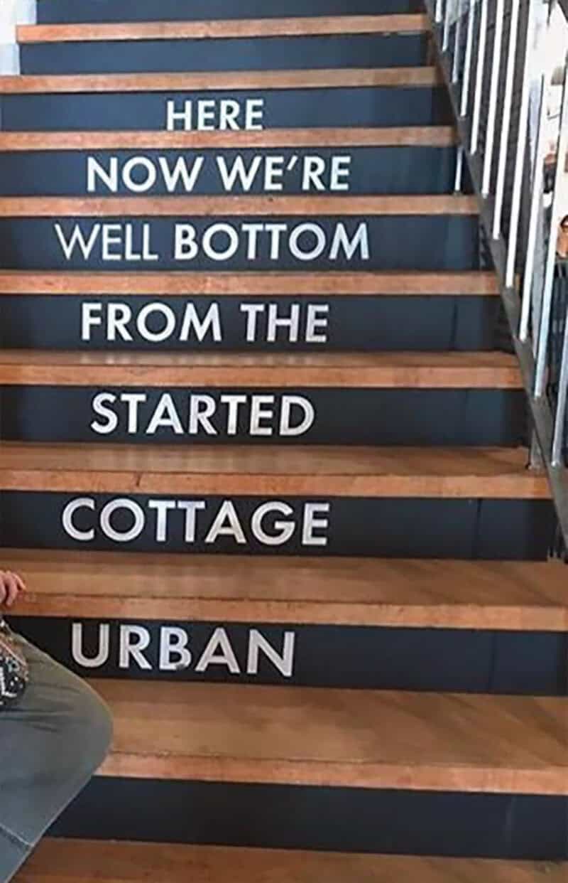 Staircase with text: Here now we're well bottom from the started cottage urban.