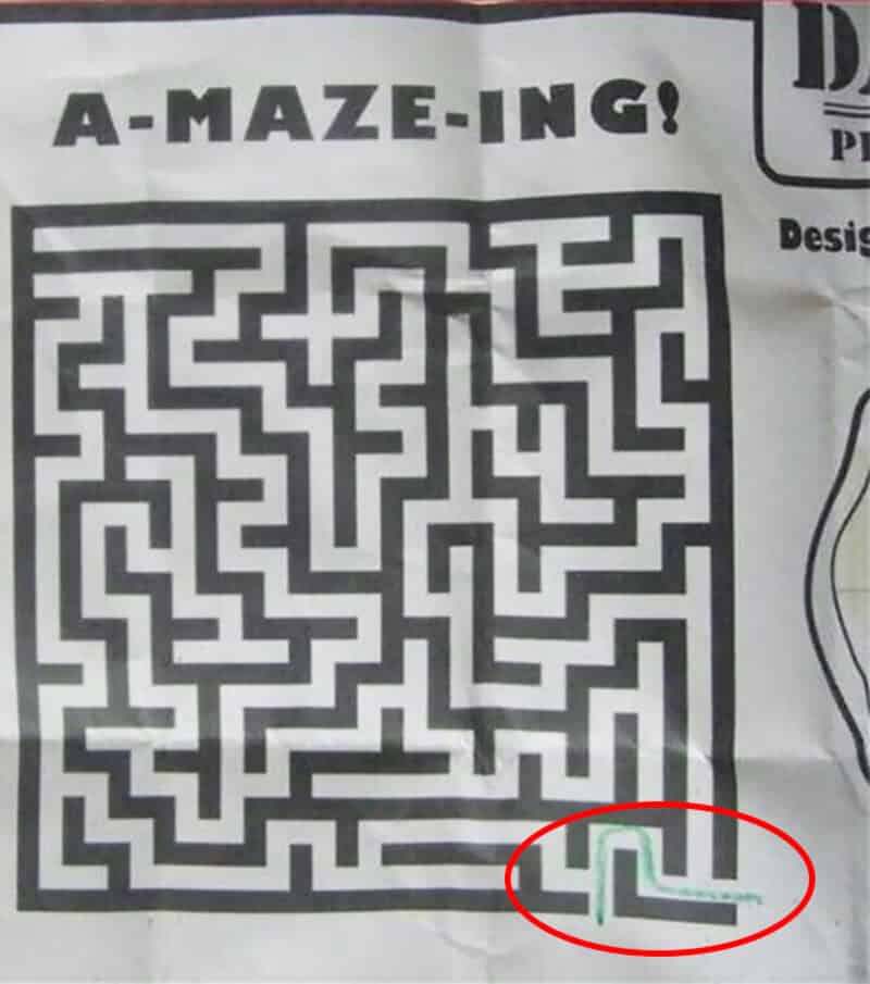 Hilarious maze puzzle with a small green and gray piece at the bottom right.