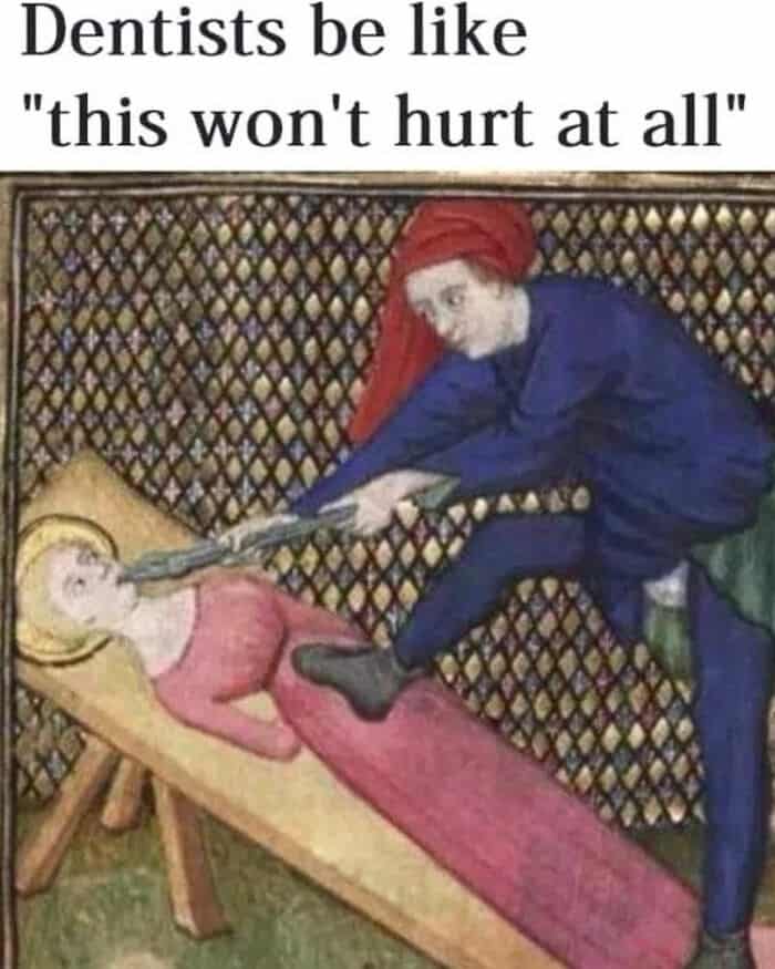 Dentist with a drill about to hurt a woman lying in a chair.