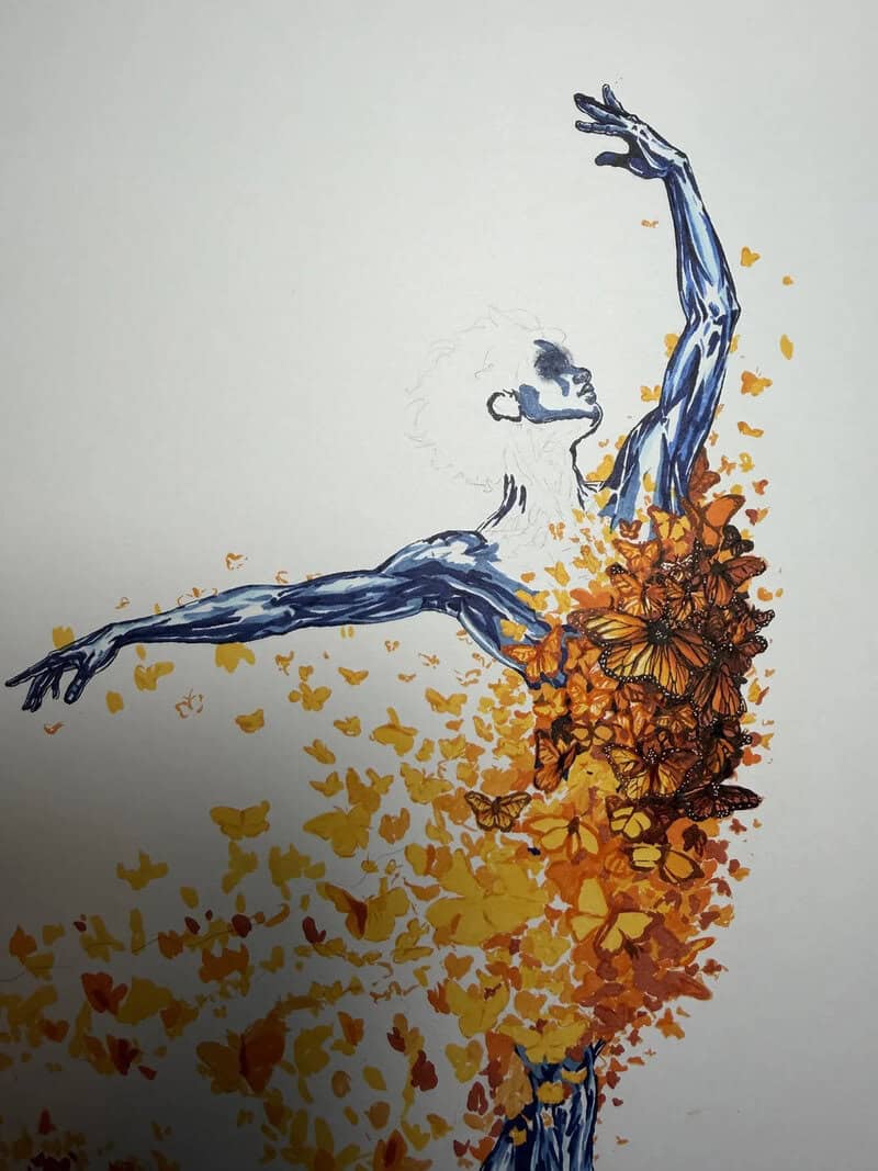 A woman dancing with a dress made of orange and yellow butterflies, arms raised gracefully.