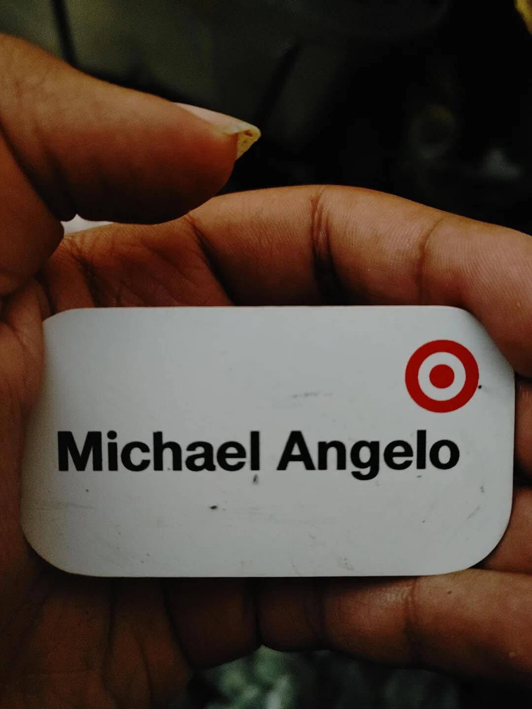 Name tag with Michael Angelo and Target logo.