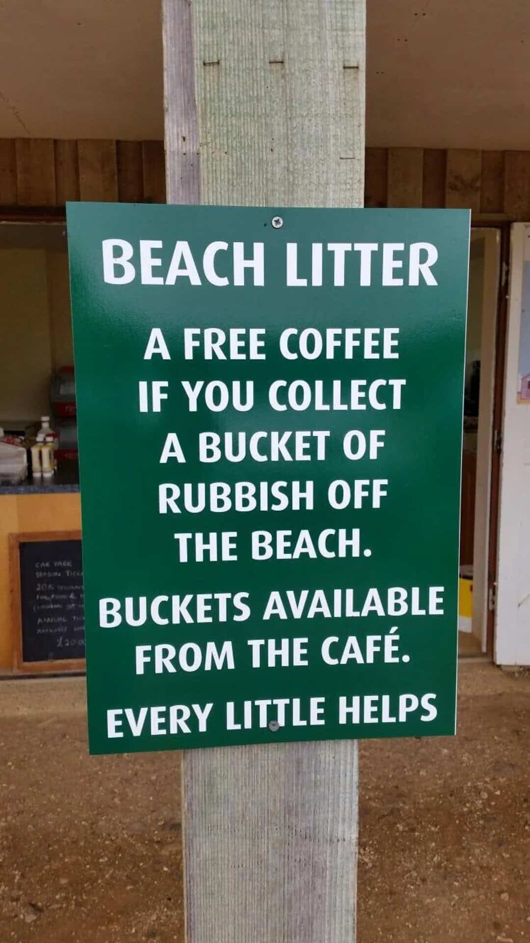 Beach litter sign offering free coffee for collecting rubbish off the beach.
