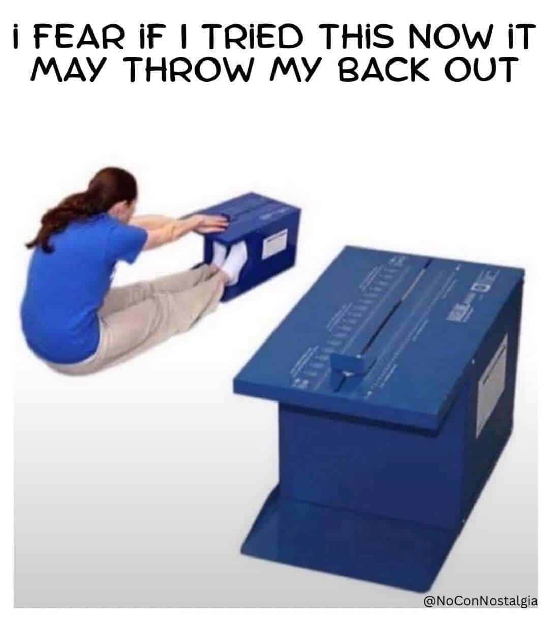 Person pushing a blue cardboard box into a larger blue box with a lid.