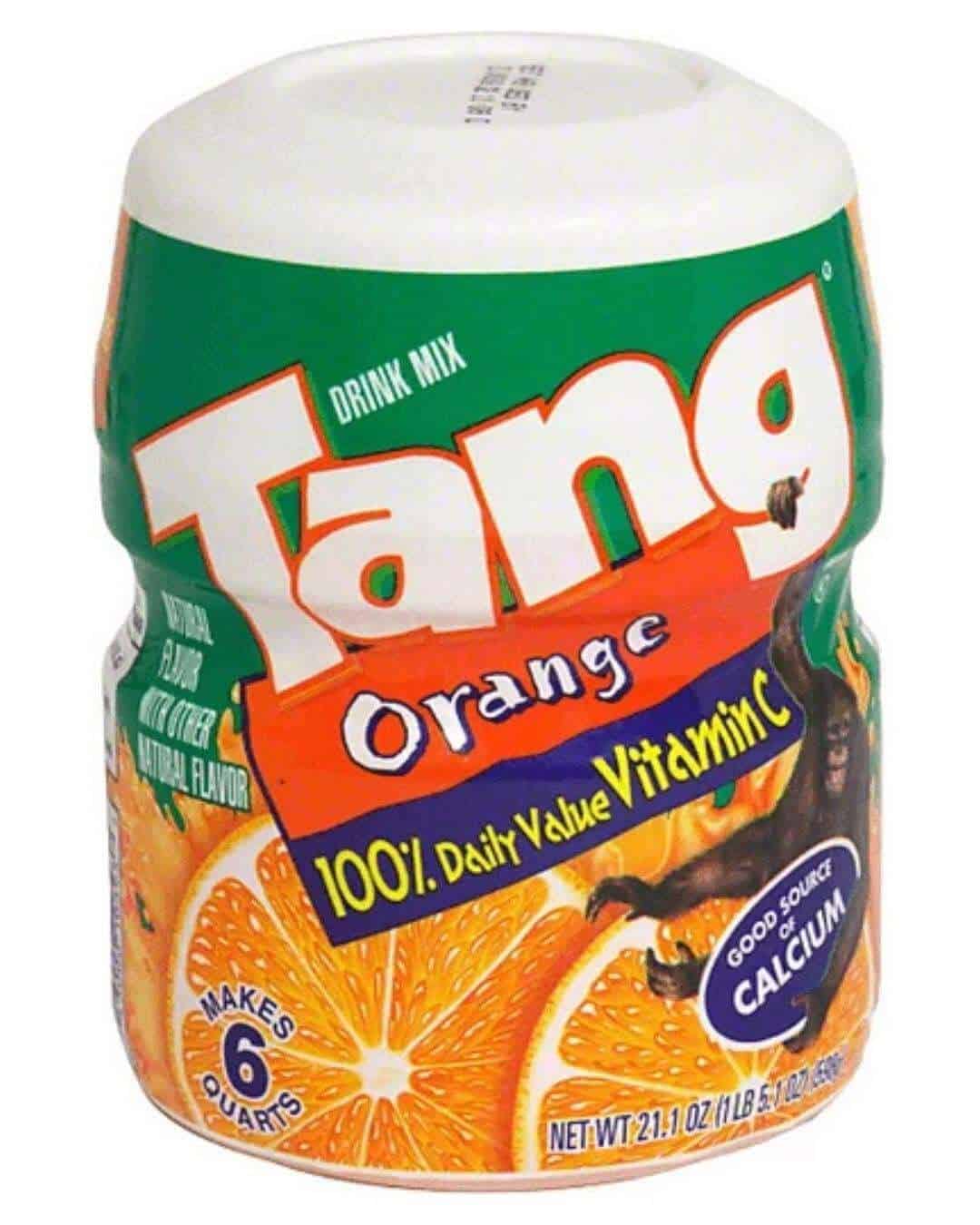 Tang Orange drink mix container with orange slices and label details.