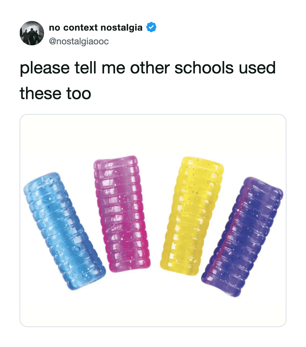 Blue, pink, yellow, and purple hair rollers in a row.