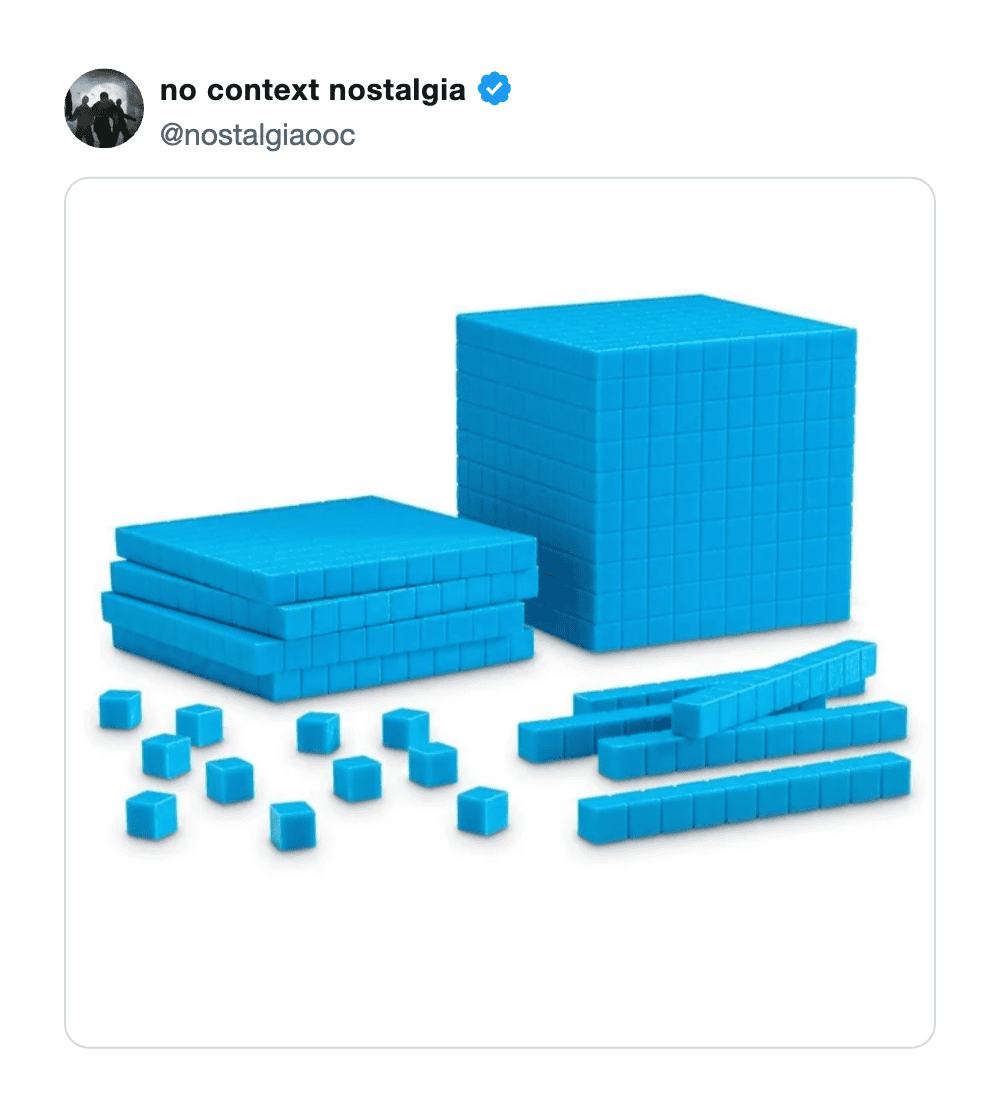 Blue 3D block puzzle with various arrangements and sizes=