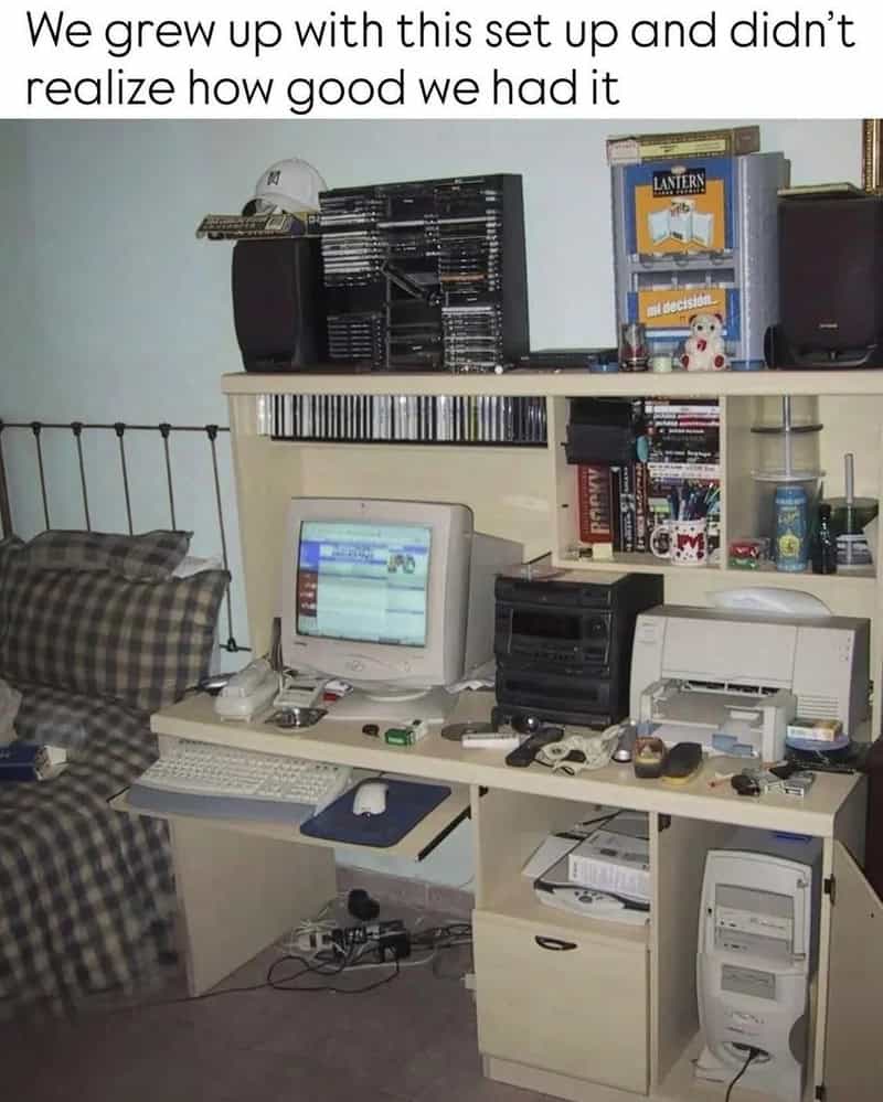 Old computer setup with various electronic devices and books on a desk, with a caption about childho.