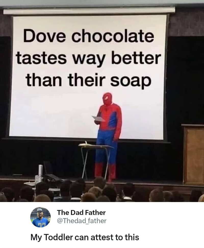Dove chocolate tastes way better than their soap, with a person dressed as Spider-Man in front of a.