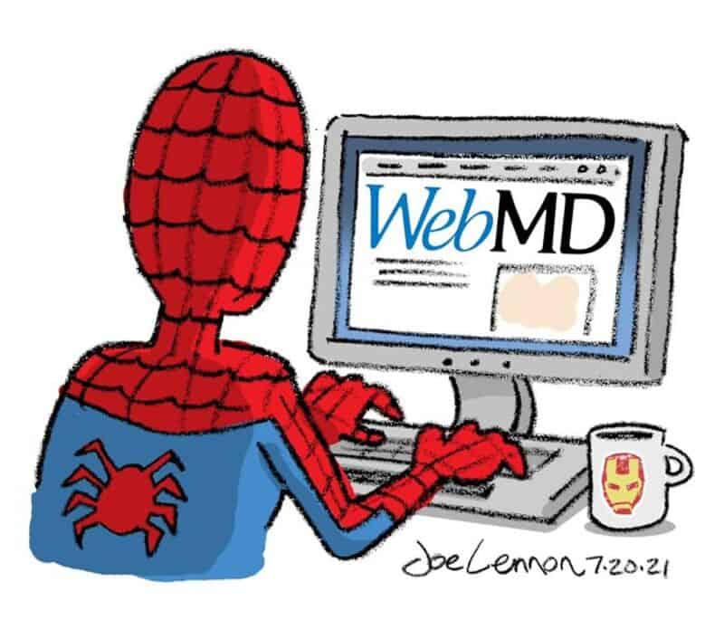 Spider-Man using a computer with WebMD on the screen and a coffee mug.