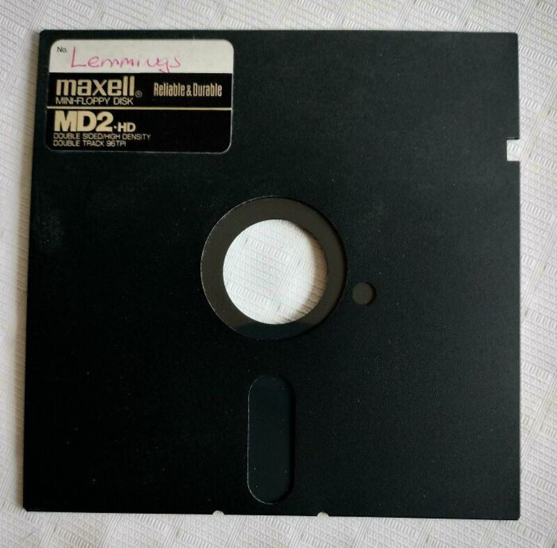 Black floppy disk with Maxell and MD2-HD labels, handwritten 'Lemmy' on top left corner.