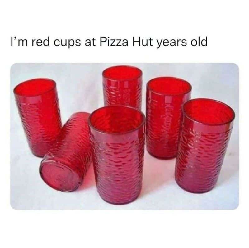 Six red cups with the caption 'I'm red cups at Pizza Hut years old'.