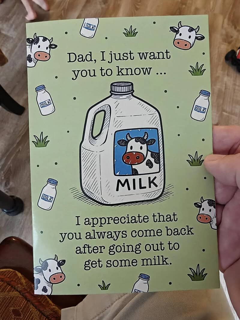 Child's note to dad about milk with cow illustrations and a milk jug drawing.