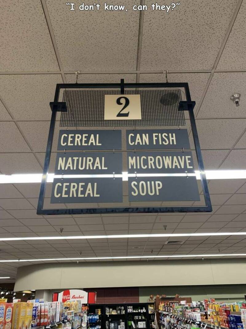 Sign with options: Cereal, Can Fish, Natural, Microwave, Cereal, Soup.