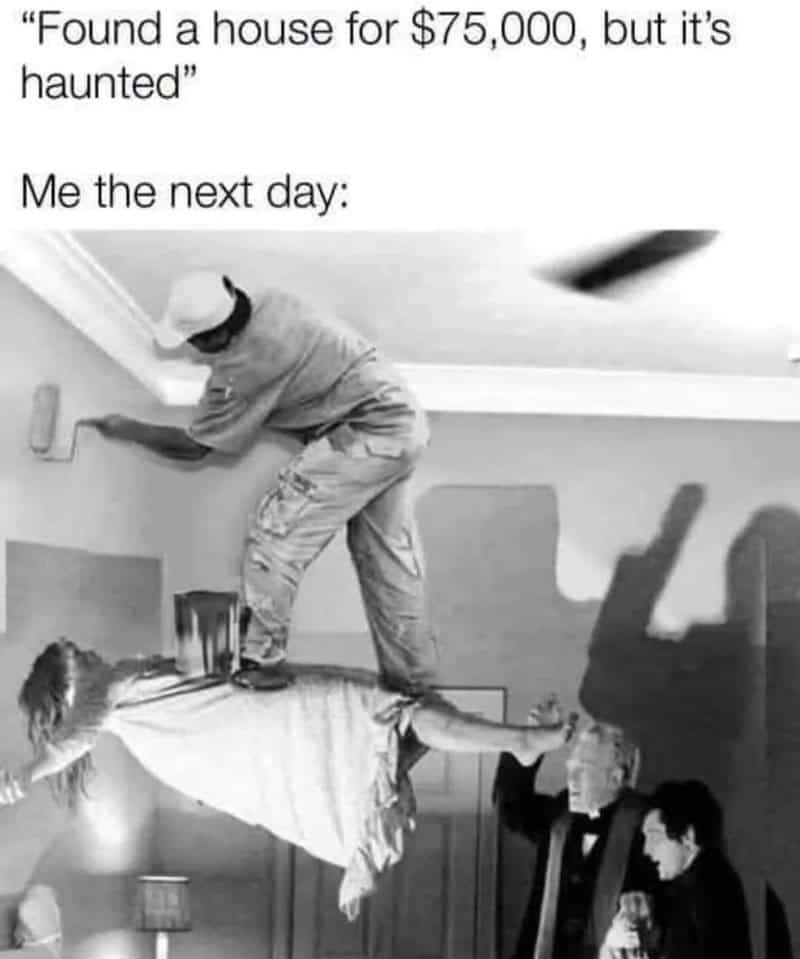 Person on ceiling fixing it, woman lying on the floor, two men watching.