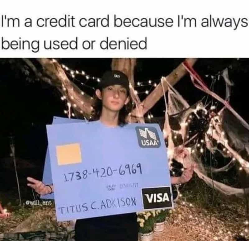 Person holding a giant fake credit card with the caption about being a credit card.