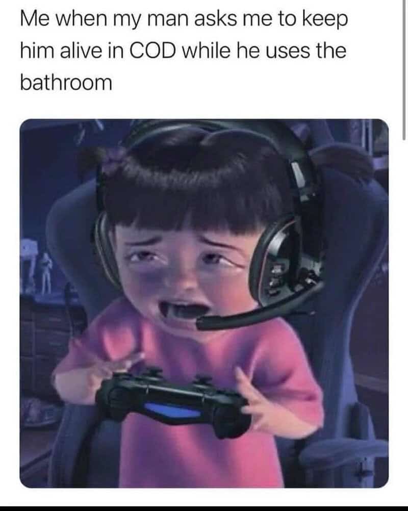 Child with headset playing video game, crying, in a gaming chair.