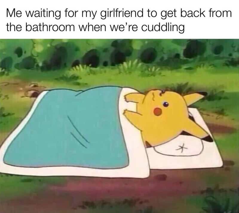 Pikachu lying in bed with a blanket, waiting for girlfriend after bathroom.