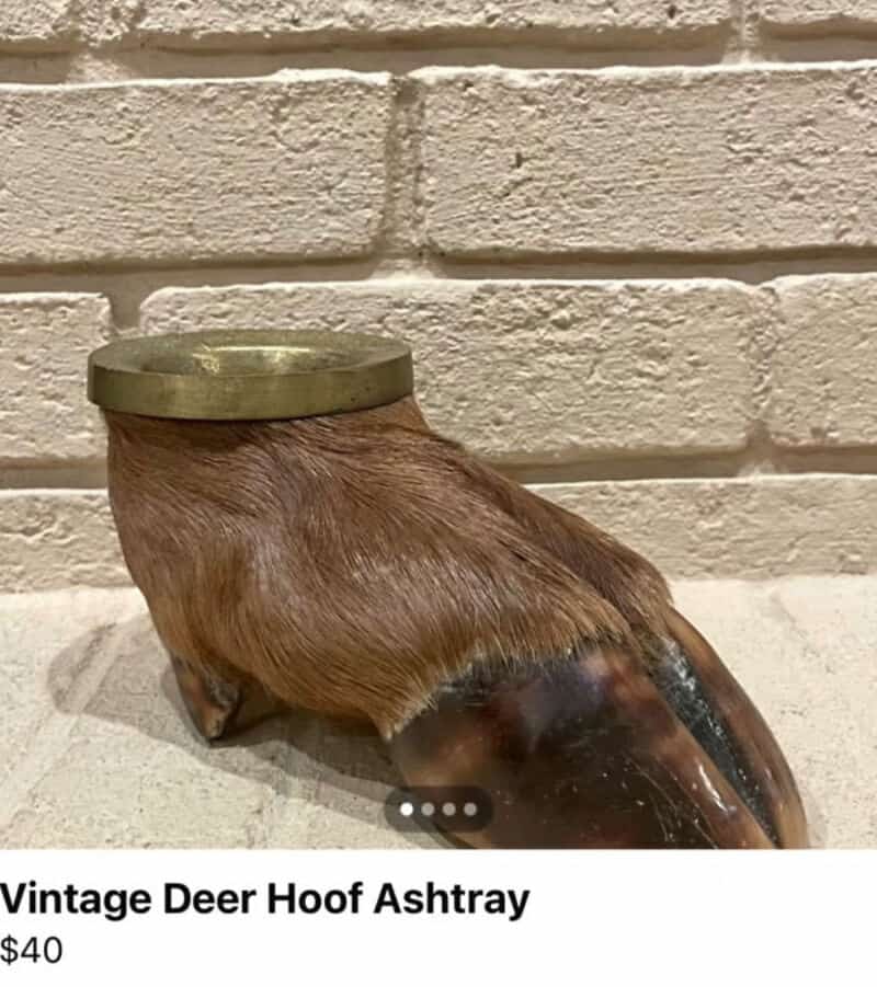 Vintage deer hoof ashtray with brass lid, brown fur, and dark hoof, priced at $40.