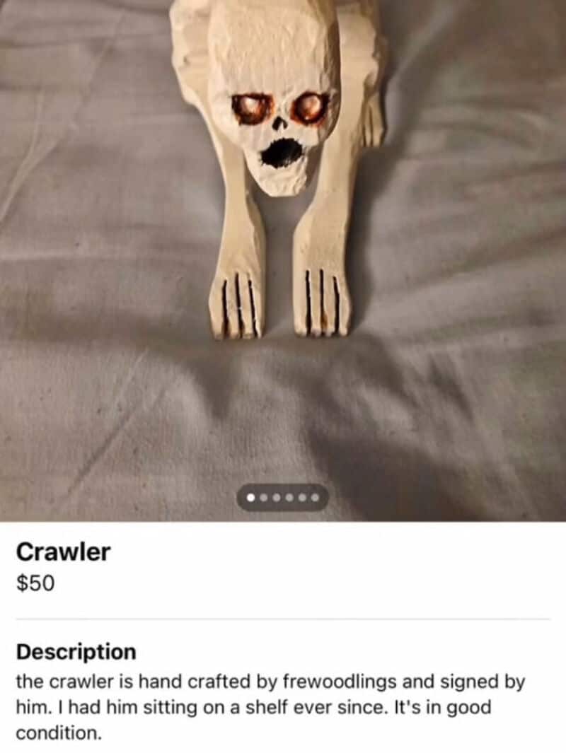 Handcrafted wooden crawler with painted skull face, signed by frewoodlings, $50.