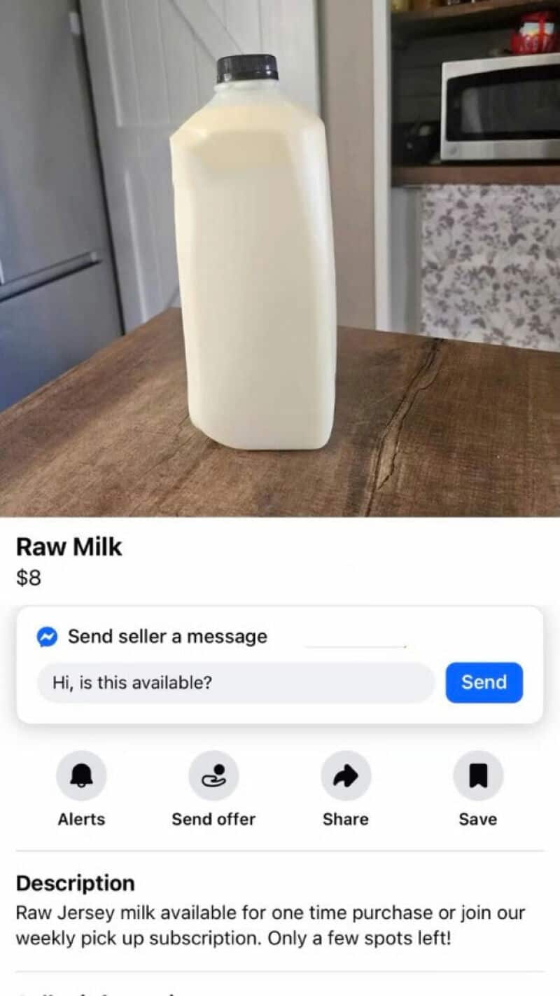 Raw Milk bottle on wooden table in kitchen, with description of raw milk availability and purchase o.