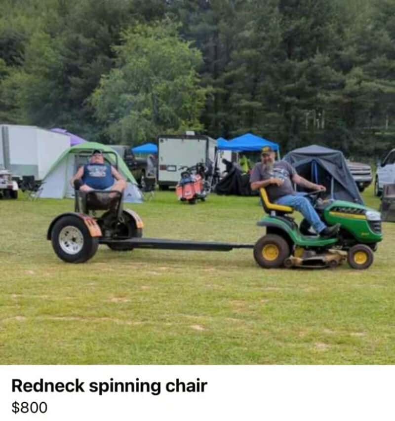 Two men on riding lawn mowers pulling a spinning chair at a campsite.