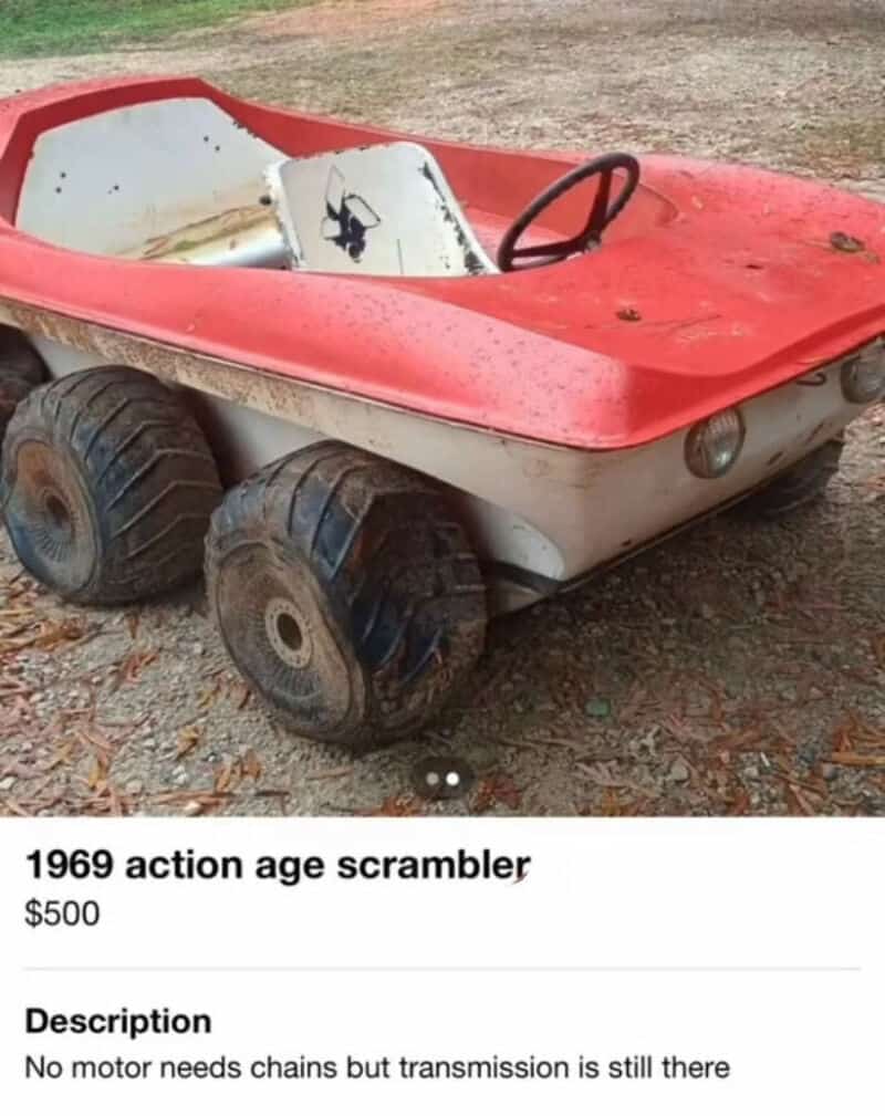 Vintage 1969 action age scrambler toy car with large wheels and red and white body.