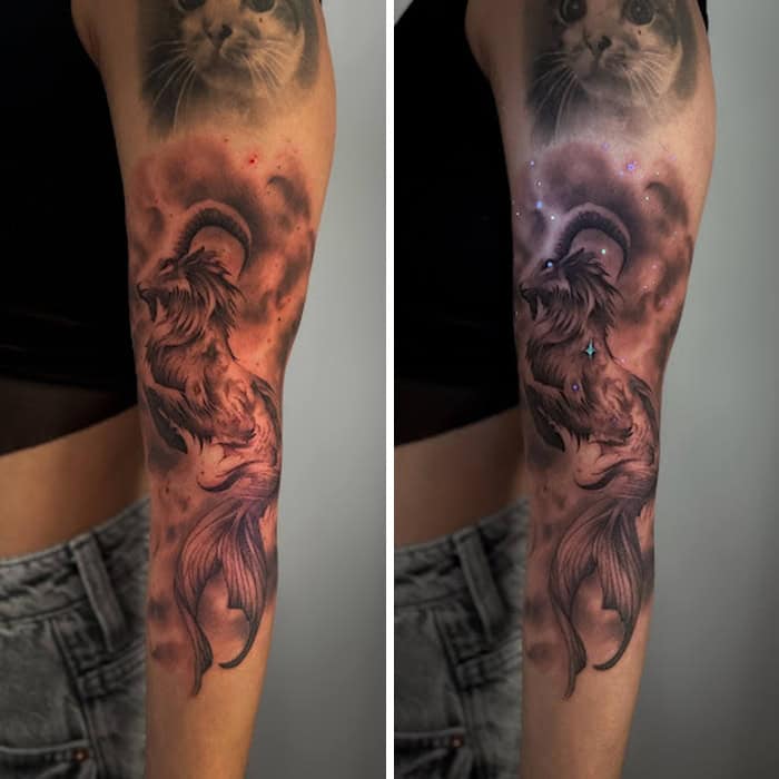 Tattoo of a lion with moon and clouds, glowing under UV light.
