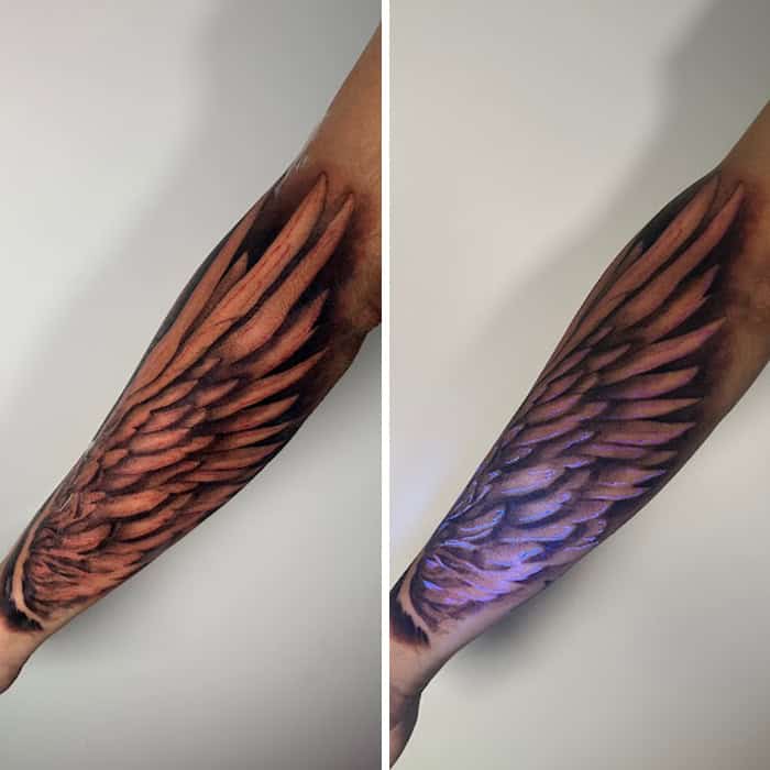 Tattoo of feathers on forearm, visible under UV light.