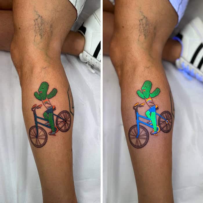 Colorful bicycle tattoo with a cactus on the seat, under UV light.