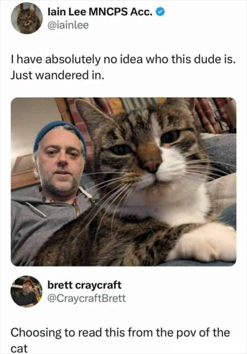 Man with a cat, caption about not knowing who the dude is.