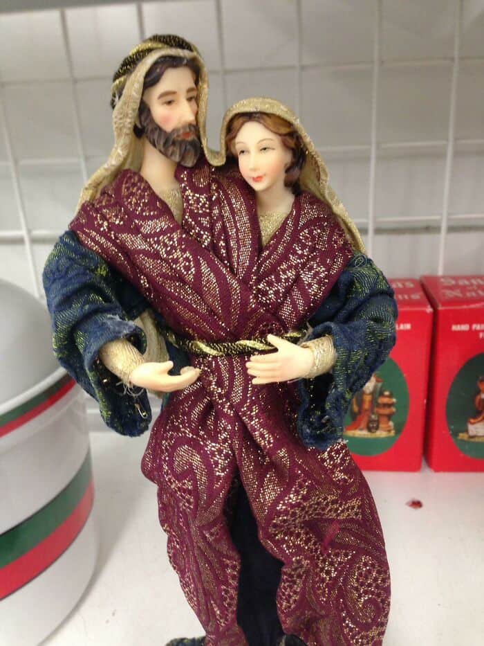 Religious figurine of Jesus Christ and Mary in detailed robes.