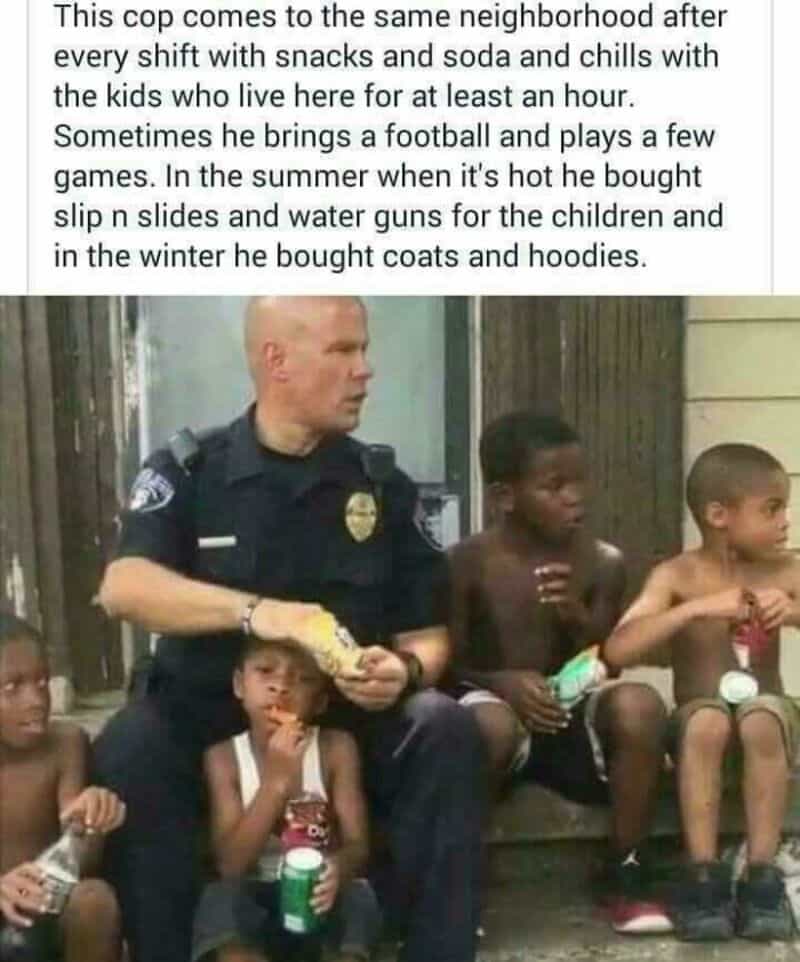 Police officer with children sitting on a bench, some drinking water.