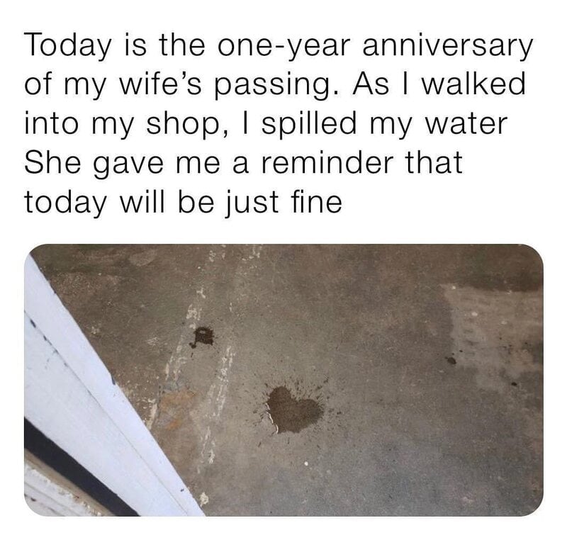 Spilled water on the floor with a heart-shaped stain, a reminder of my wife's passing.