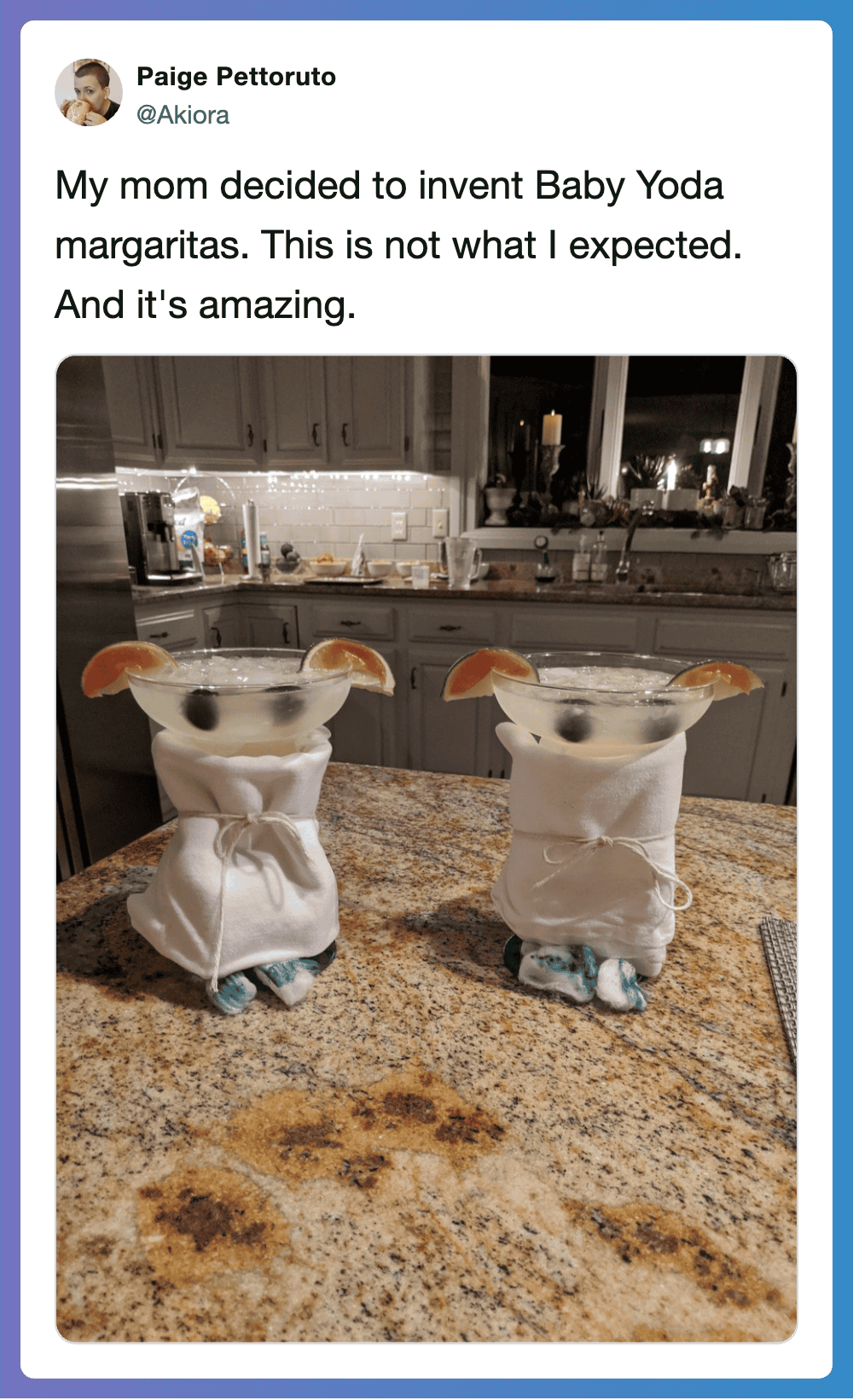 My mom's inventive Baby Yoda margaritas in glasses with Baby Yoda figurines, garnished with lime sli.