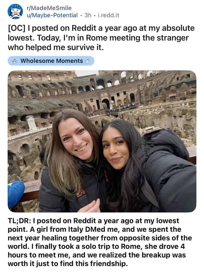 Two women smiling in the Colosseum in Rome, Italy.