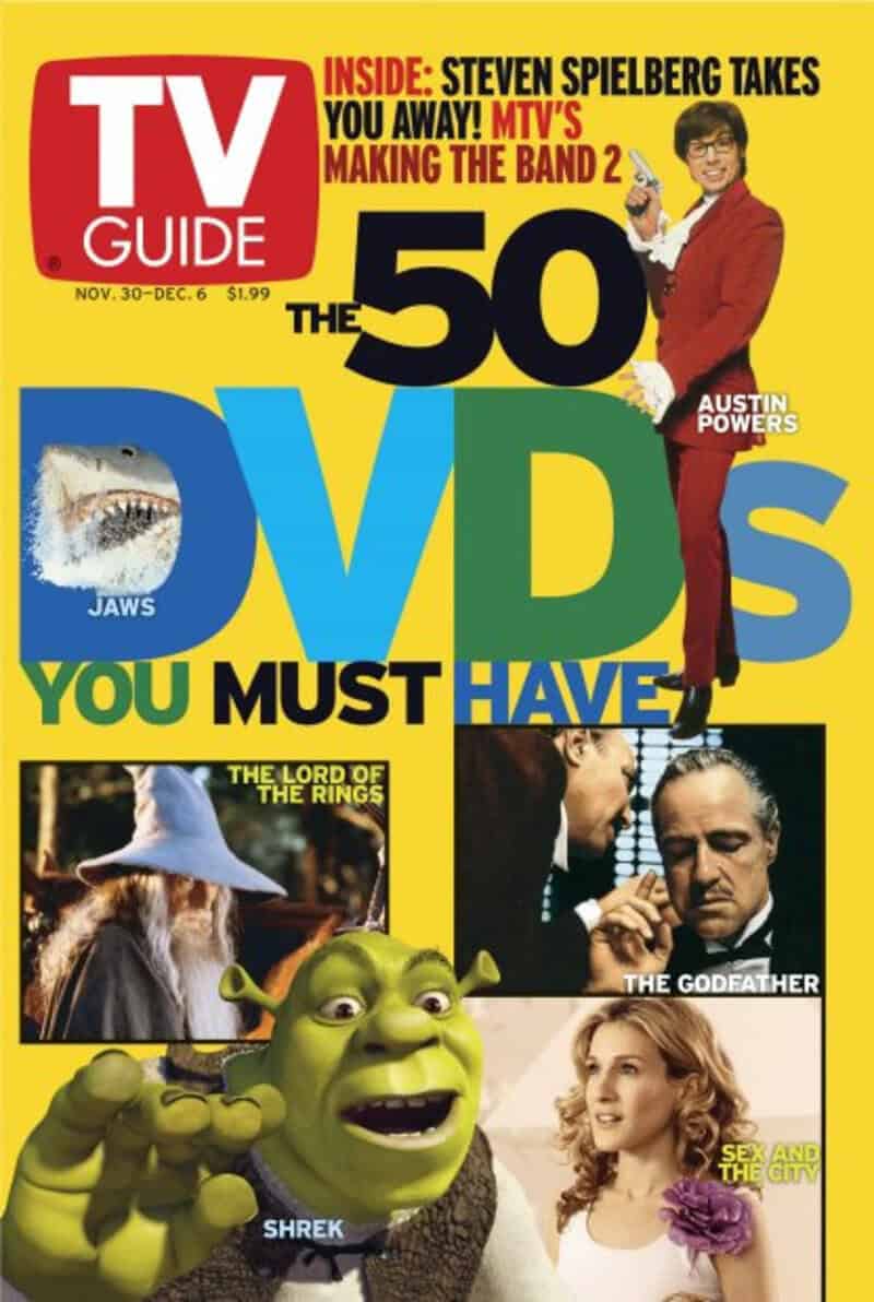 Cover of TV Guide with 'The 50 DVDs You Must Have' and images of Shrek, Lord of the Rings, Jaws, God.