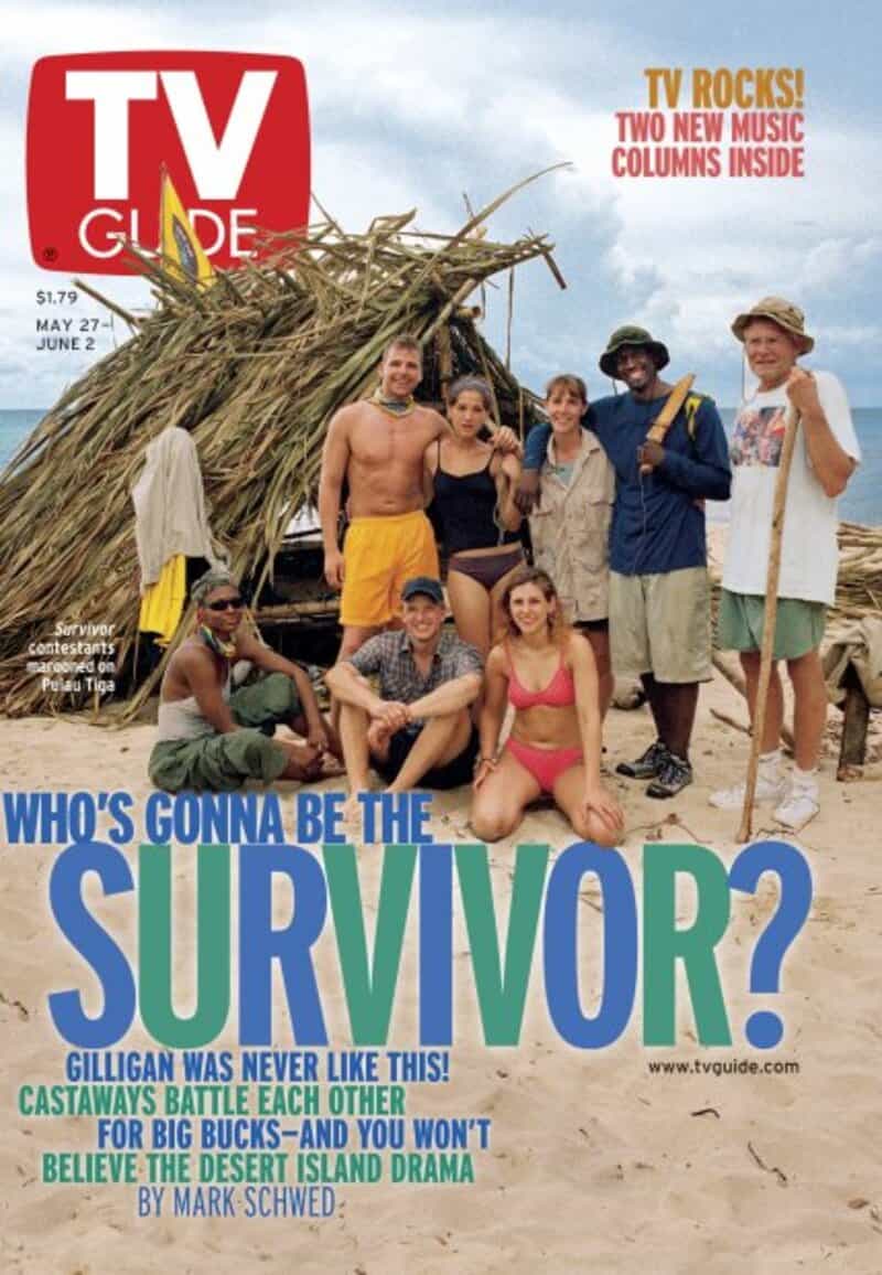 TV Guide cover with a group of people on a beach, some in swimsuits, with a makeshift shelter.