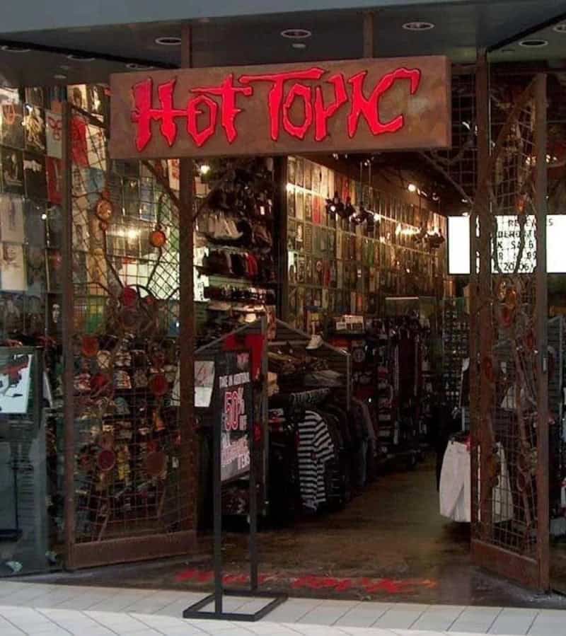 Entrance to Hot Topic store with open gates and merchandise inside.