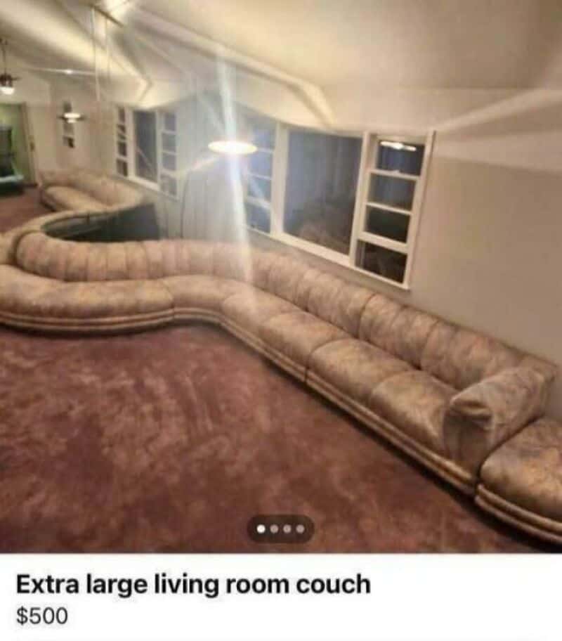 Extra large living room couch with multiple sections and a curved shape.