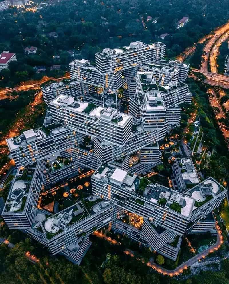Aerial view of a large, modern, uniquely designed residential complex with multiple interconnected,Z.