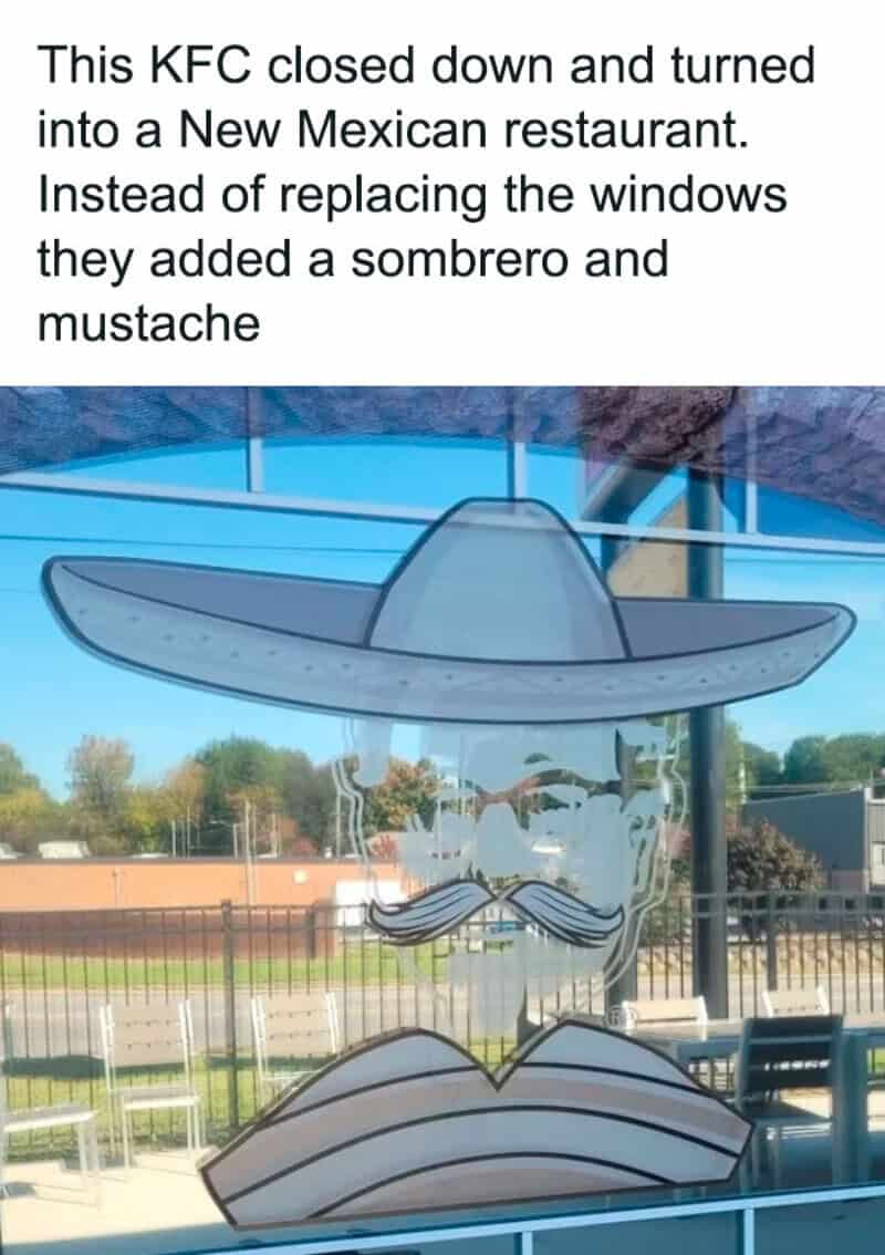 KFC window display with sombrero, mustache, and mustache.