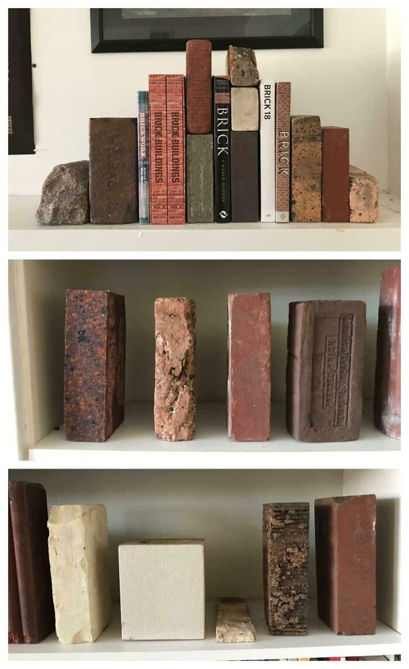 Collection of various bricks on white shelves, some with text and different textures.