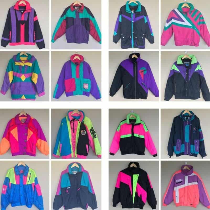 Collection of colorful vintage 80s and 90s jackets on hangers.