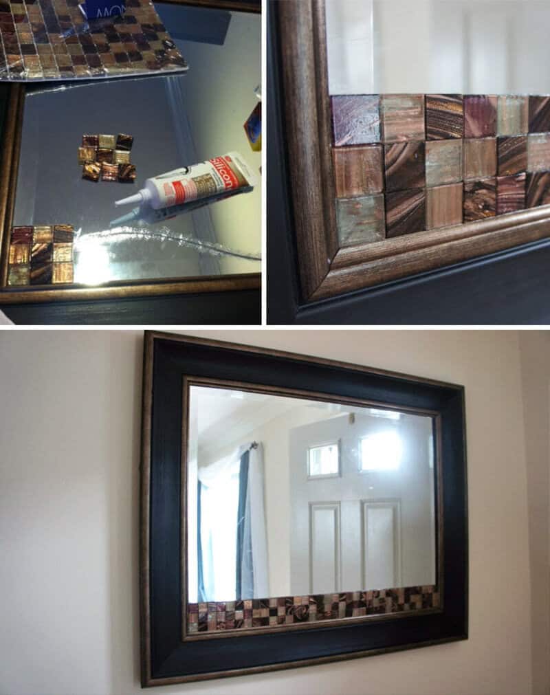 DIY mirror with mosaic frame and glue bottle on table.