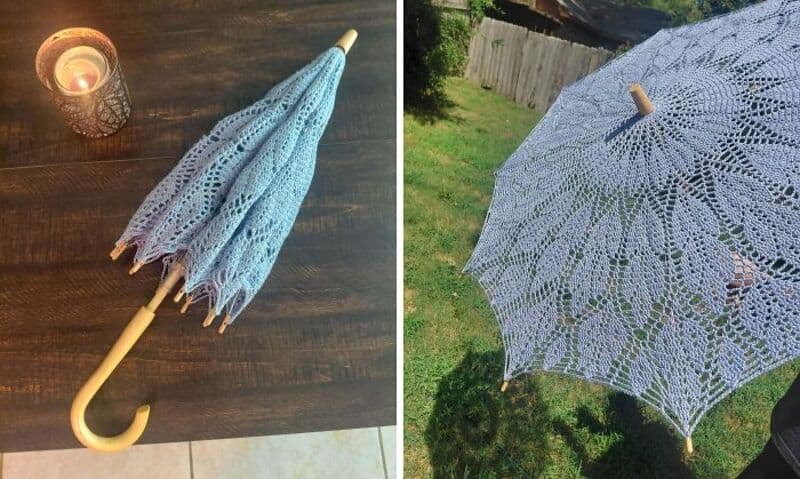 Crochet umbrella with a wooden handle and intricate lace pattern.