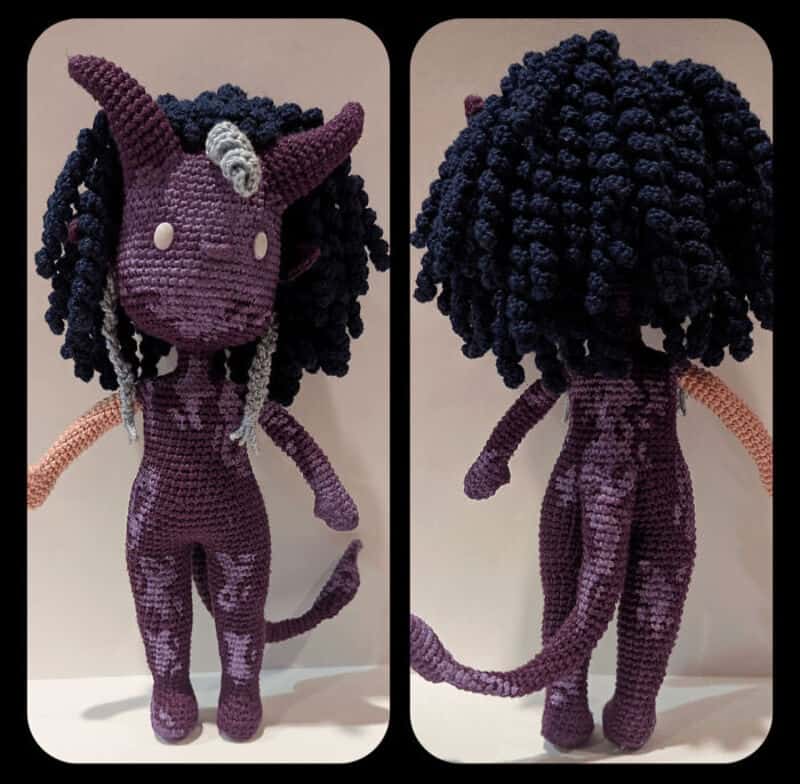 Crochet unicorn doll with dark curly hair, purple body, and pink tail, front and back views.